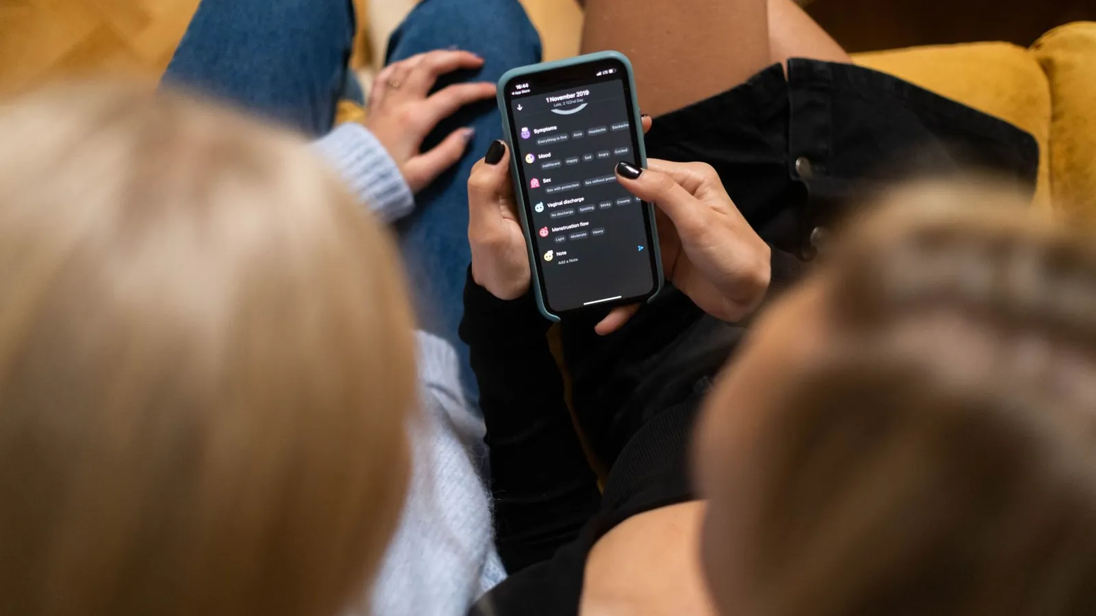 Person browsing a social media app on a phone, comparing app analytics with Google Search Console data
